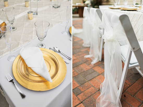 Wedding table setting with golden plate and chair decor