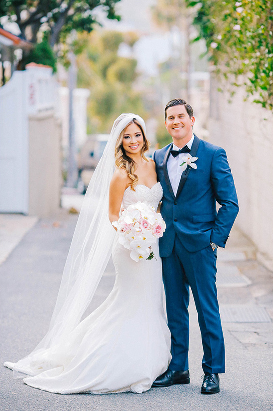 Bride and groom posing together on their wedding day