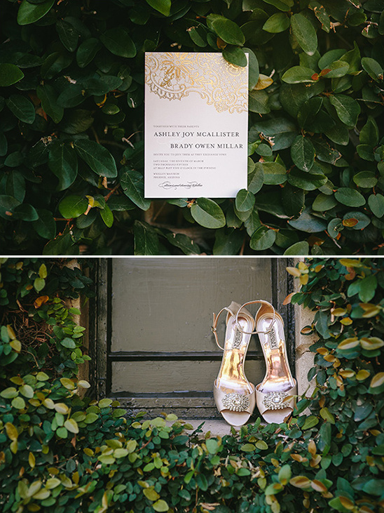 Elegant wedding details invitation and heels with greenery