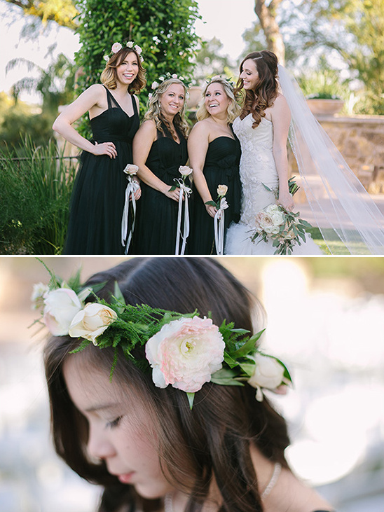 Bride and bridesmaids wearing flower crowns at wedding