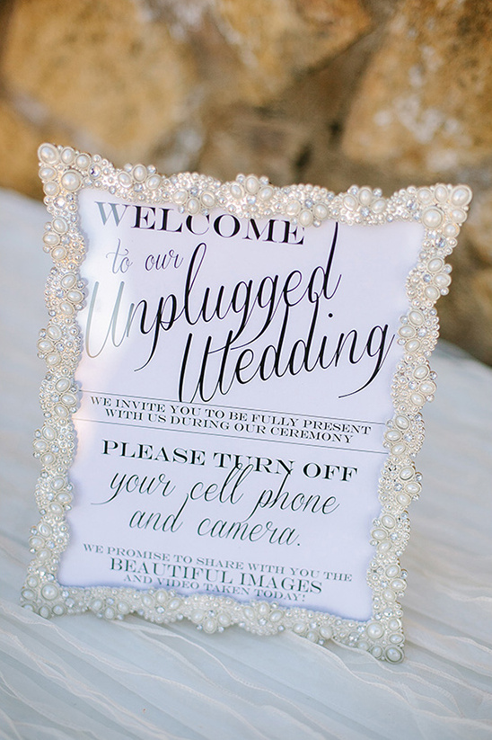 Elegant unplugged wedding sign with pearl frame decor