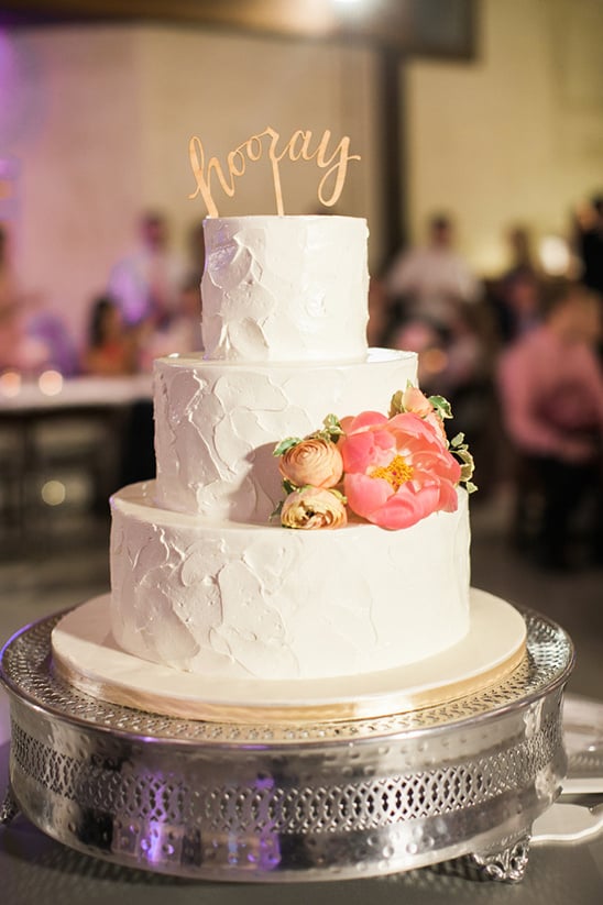 white wedding cake with flowers @weddingchicks