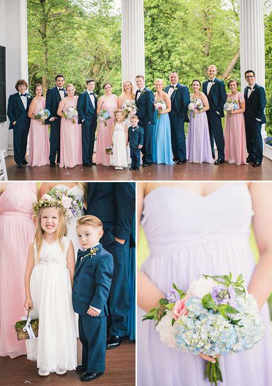 Wedding party in pastel dresses and suits on porch
