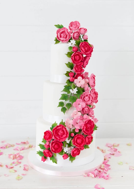 pink flower topped cake @weddingchicks