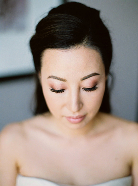 Asian bride with soft natural makeup for her wedding