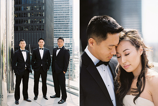 Groom and bride share tender moment, groomsmen in background