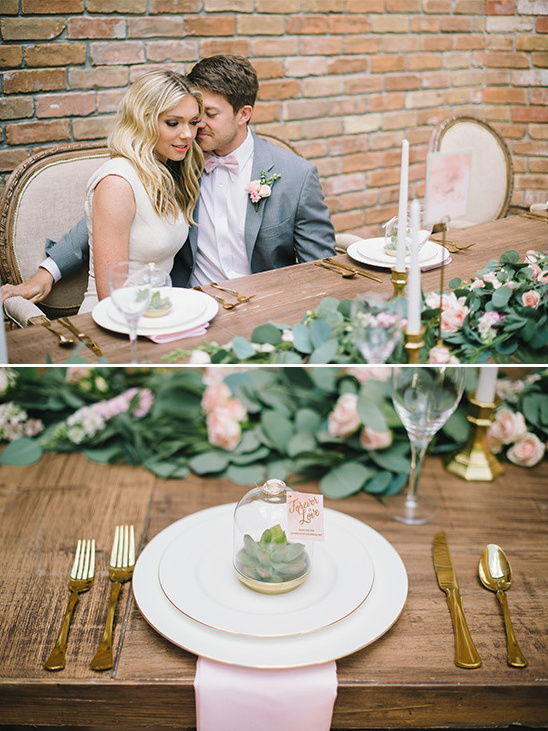 Wedding table setting with couple and floral decor