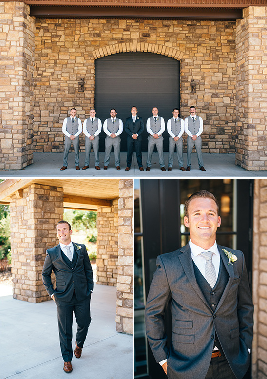 Groom with groomsmen in gray wedding suits outside