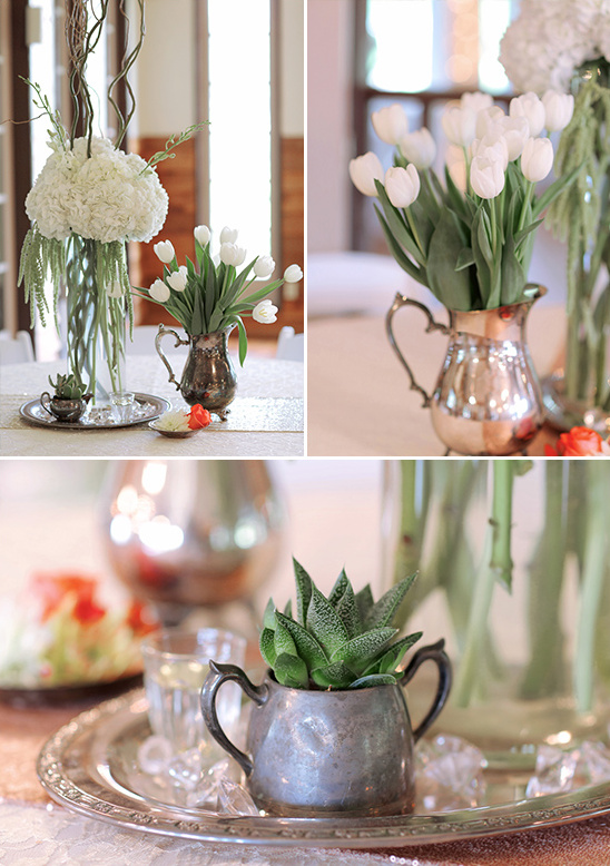 Elegant wedding centerpieces white flowers silver pitchers