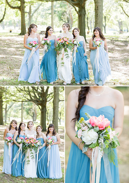 Bridesmaids in blue dresses with bouquets wedding day