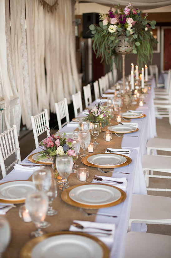 Elegant wedding table setting with flowers and candles