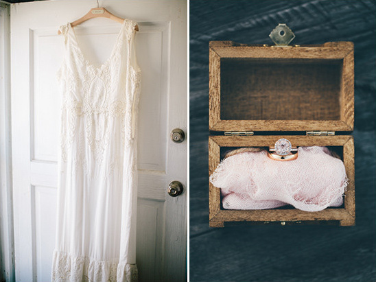 Wedding dress and rings in wooden box ready for ceremony