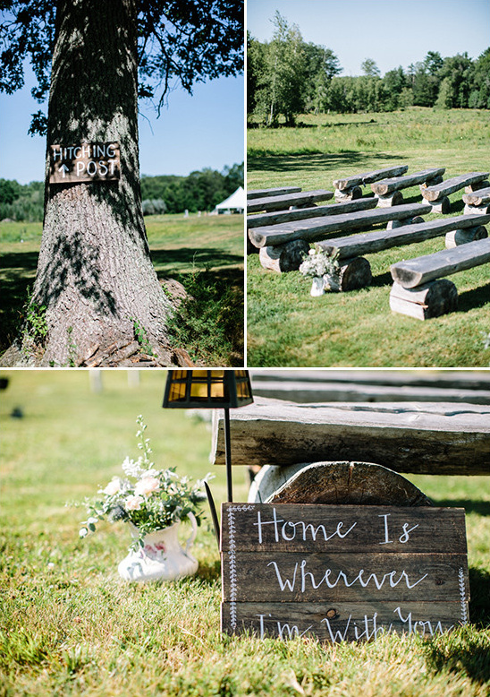 Rustic wedding ceremony setup with wooden benches and sign