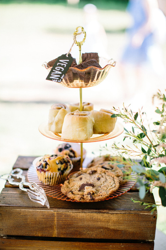 Three tier stand with vegan treats like brownies and cookies