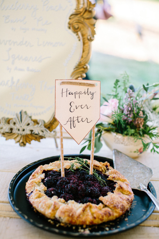 Blackberry tart with Happily Ever After sign for wedding