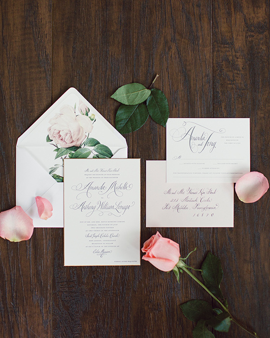 Elegant wedding invitations with floral details and rose