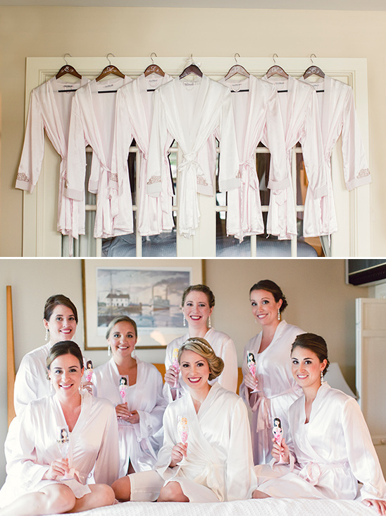 Bride and bridesmaids in silk robes before wedding
