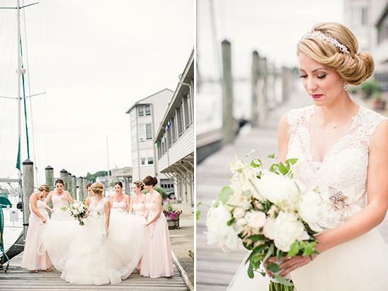 Bride with bridesmaids on a pier wedding day photo