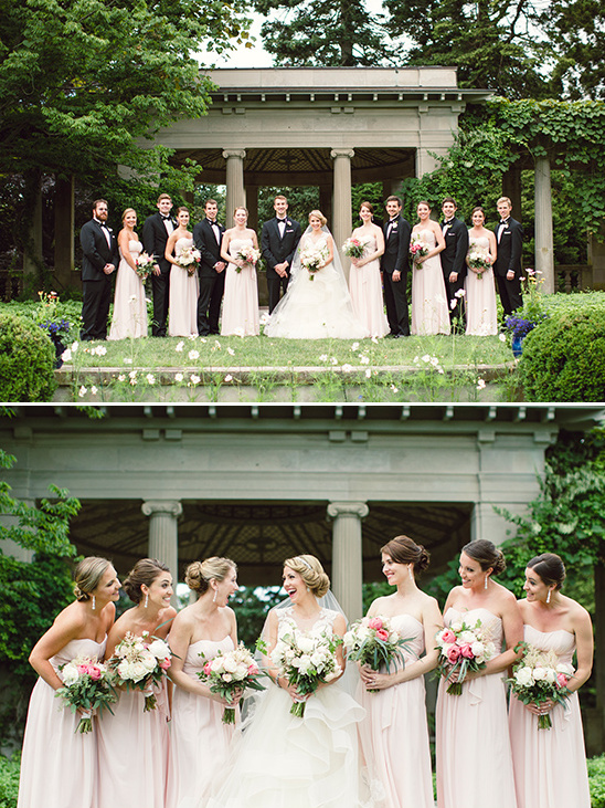 Elegant wedding party in formal attire at outdoor venue