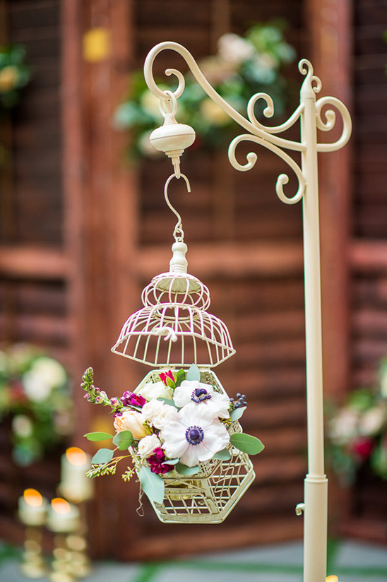 floral bird cage wedding decor @weddingchicks