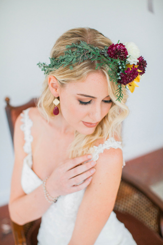 Blonde bride in a floral crown and wedding dress