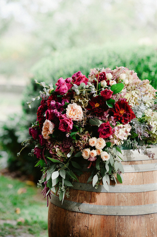 flower topped barrel @weddingchicks