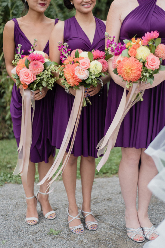 bright bouquets and purple bridesmaids @weddingchicks