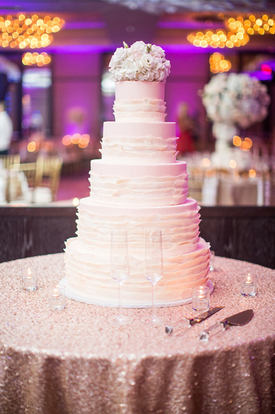 tall white ruffle wedding cake @weddingchicks