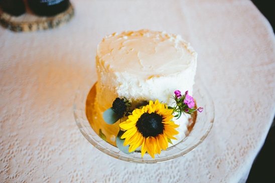wedding cake with sunflowers @weddingchicks