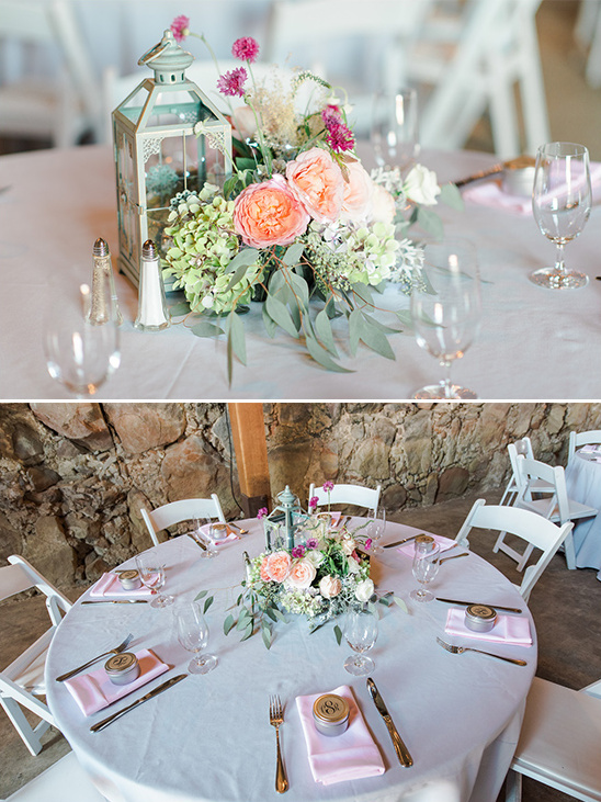 Elegant wedding table decor with flowers and a lantern centerpiece