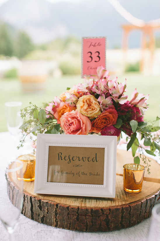 peach pink and orange floral centerpiece @weddingchicks