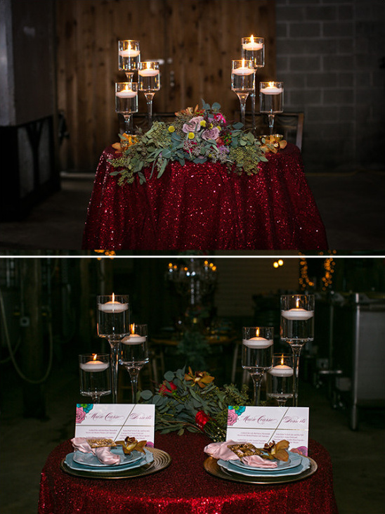 Elegant wedding table with candles and red sequin tablecloth