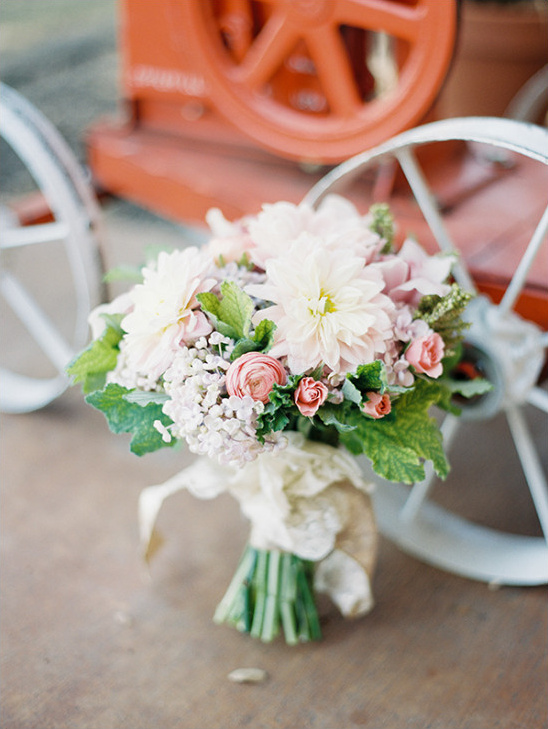 Vintage wedding bouquet with blush and cream flowers