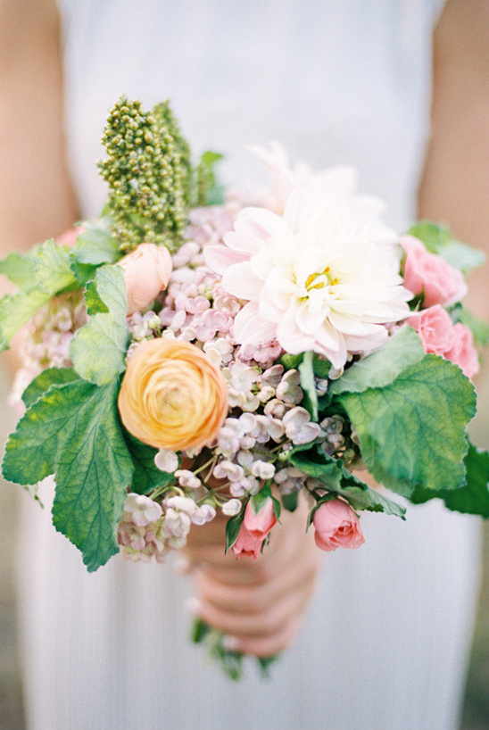 Bridal bouquet with dahlia roses and greenery