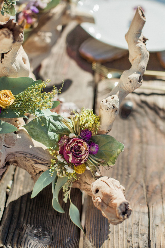 flower covered drift wood centerpiece @weddingchicks