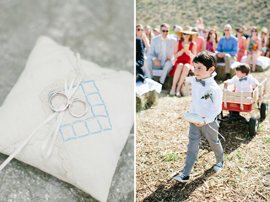 Ring bearer with pillow at outdoor wedding ceremony