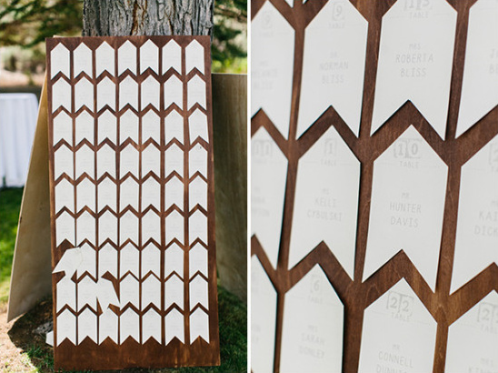 Rustic wood wedding seating chart with guest names