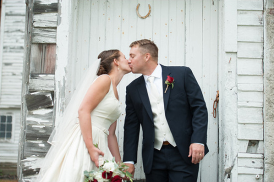Bride and groom share a kiss on their wedding day