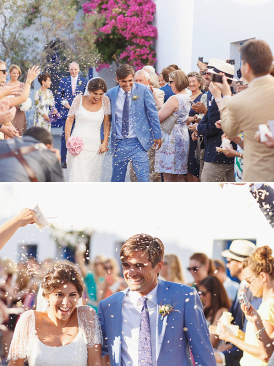 Newlyweds showered with confetti at their wedding