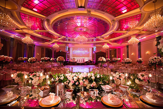 Elegant wedding reception venue with pink decor