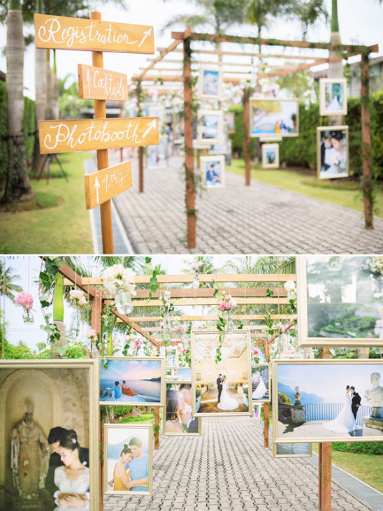 wedding photos displayed like a walk through art gallery