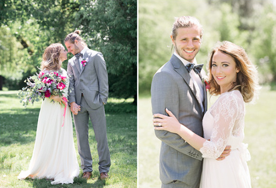 Happy bride and groom posing in garden for wedding photos