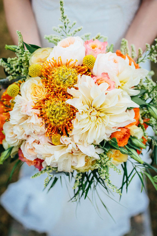 orange and yellow wedding bouquet @weddingchicks