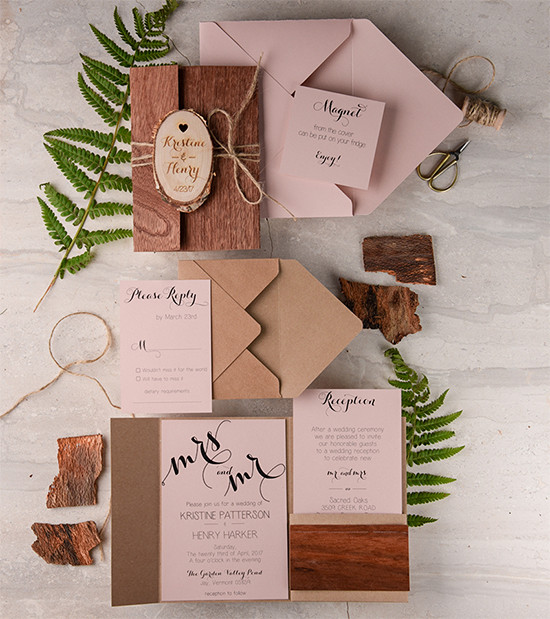 Elegant wedding invitation suite with natural wood accents