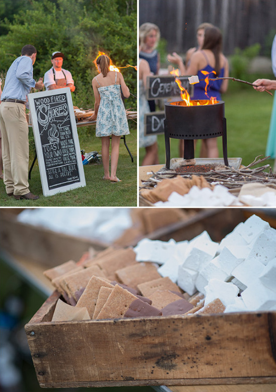 Smores station with graham crackers, marshmallows, fire