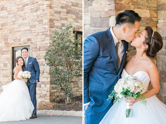 Happy couple kissing at their wedding ceremony