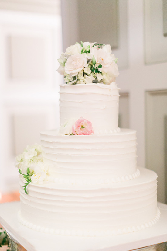 White and pink three tier wedding cake