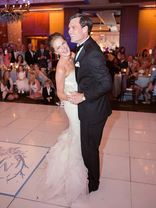 Bride and groom share their first dance wedding day
