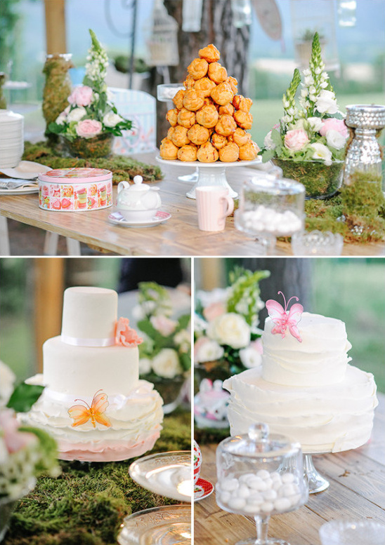 Wedding desserts table with cakes and flowers decor