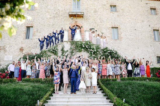 Wedding group photo at Italian villa with happy guests